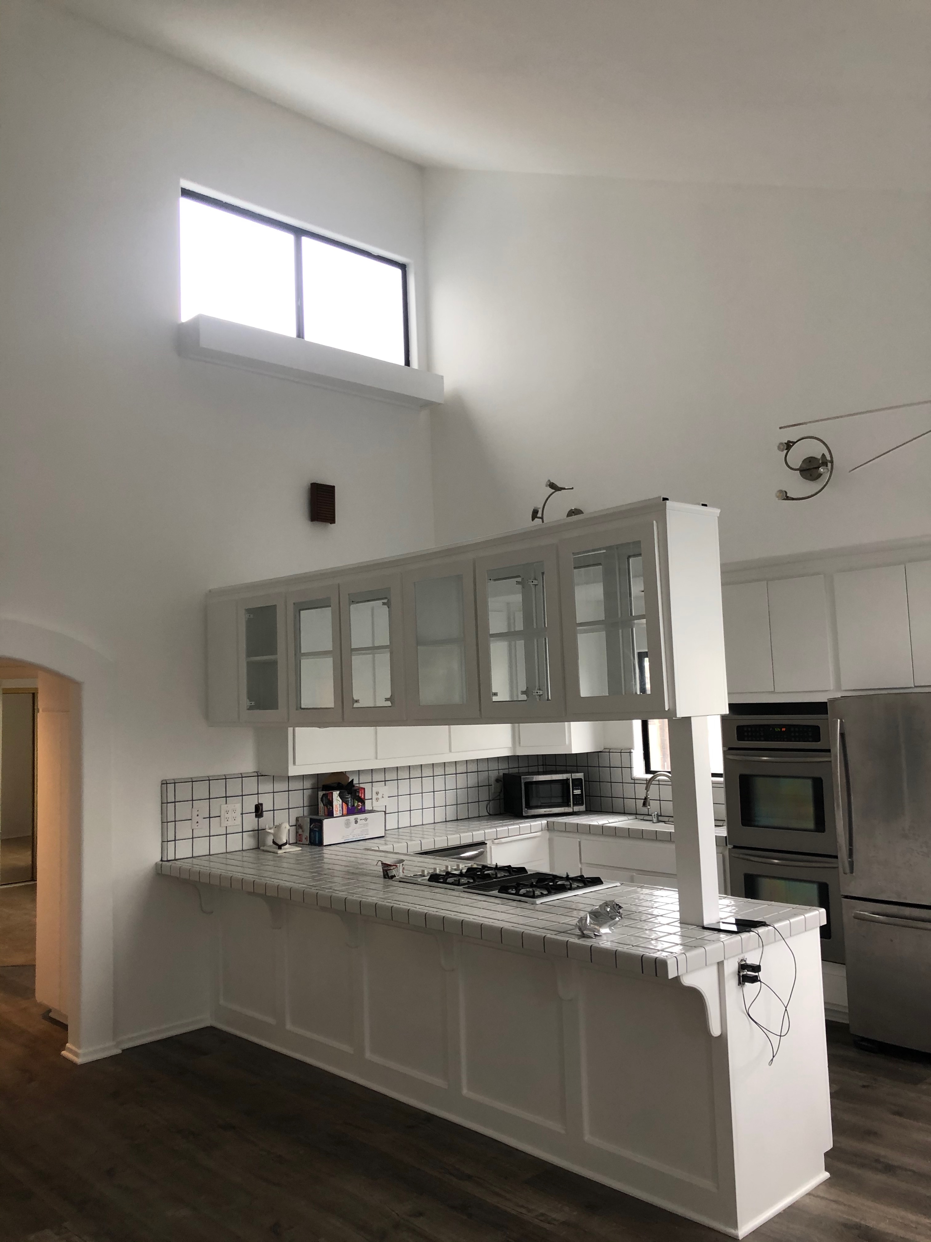 White kitchen cabinetry and interior finishes